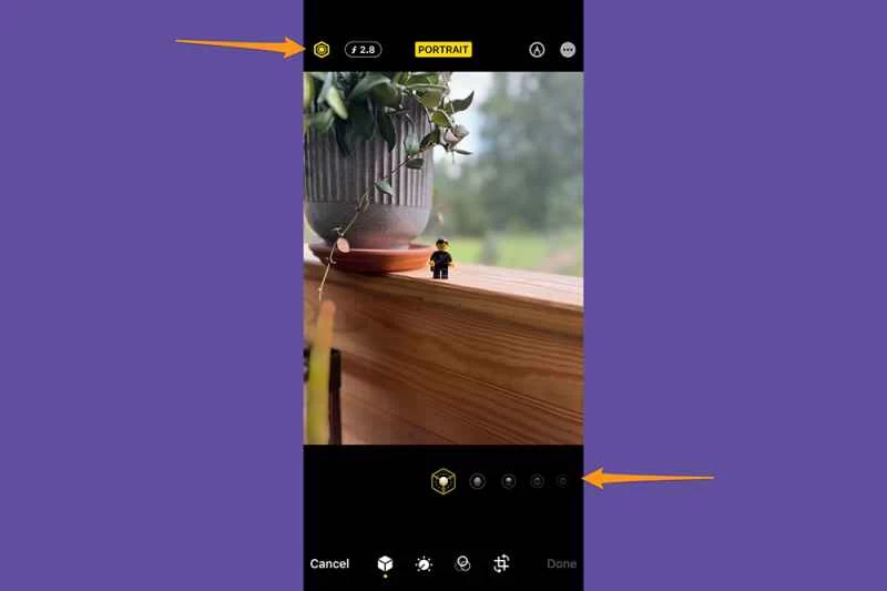 iPhone 照片應用程式處於編輯模式,顯示人像模式特有的編輯工具,例如光圈和光效。