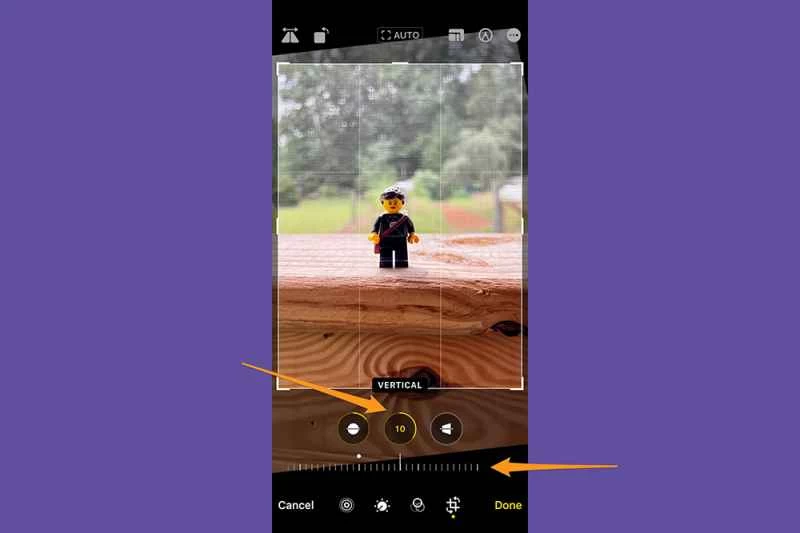 iPhone 照片應用程式處於編輯模式,示範如何調整垂直透視。